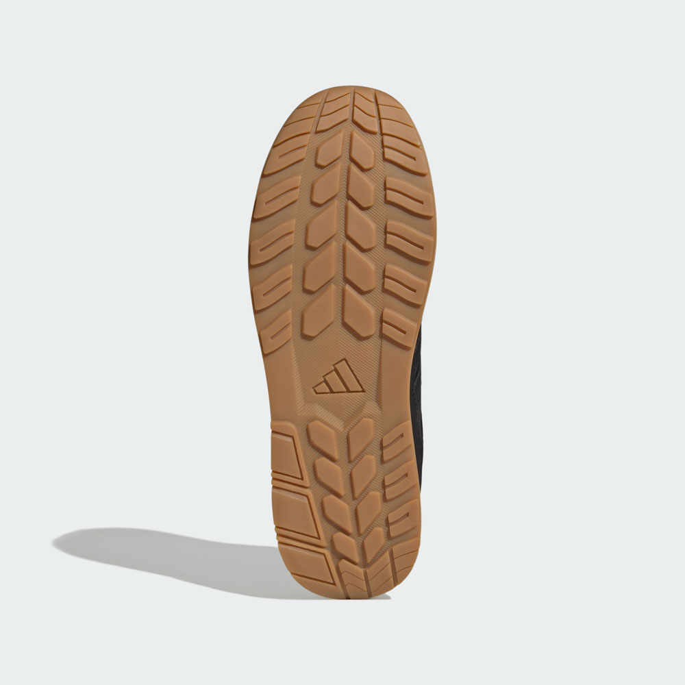 Profilsohle des ADIDAS Motix LOW S1PS Sicherheitsschuhs mit rutschhemmendem Laufsohlenprofil in Braun und adidas-Logo