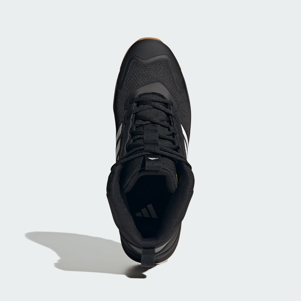Schwarzer adidas Sneaker mit weißen Streifen und brauner Gummisohle in der Ansicht von oben